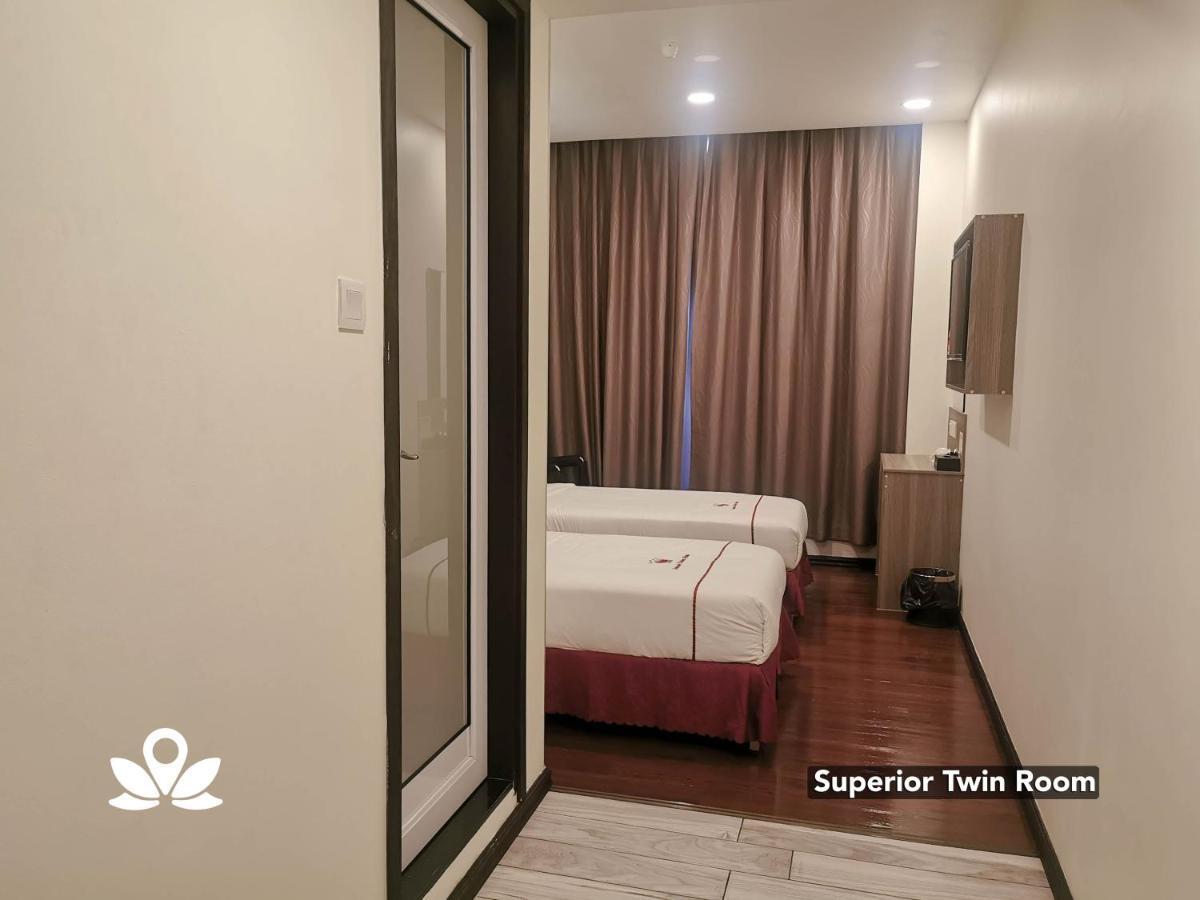 Zen Rooms Ambassador Residence Бинтулу Экстерьер фото