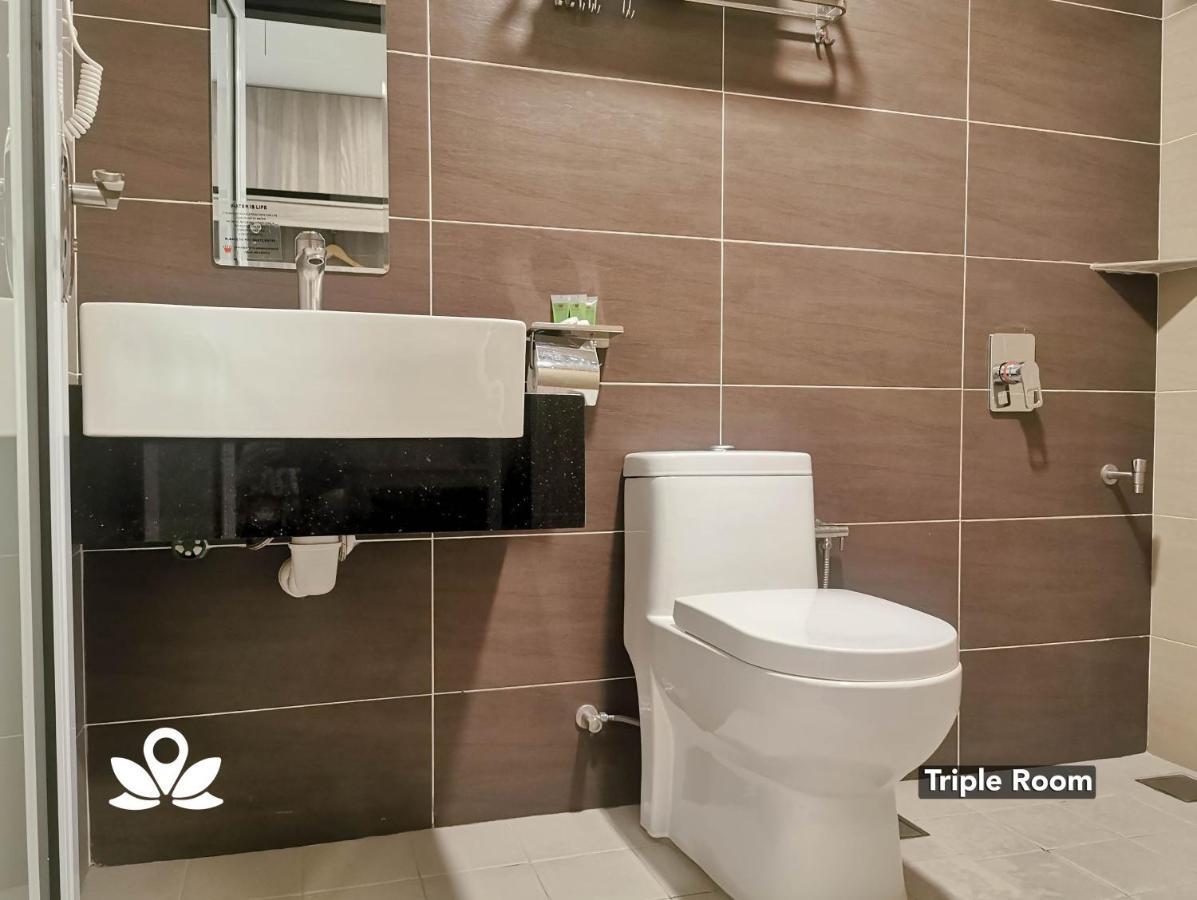 Zen Rooms Ambassador Residence Бинтулу Экстерьер фото